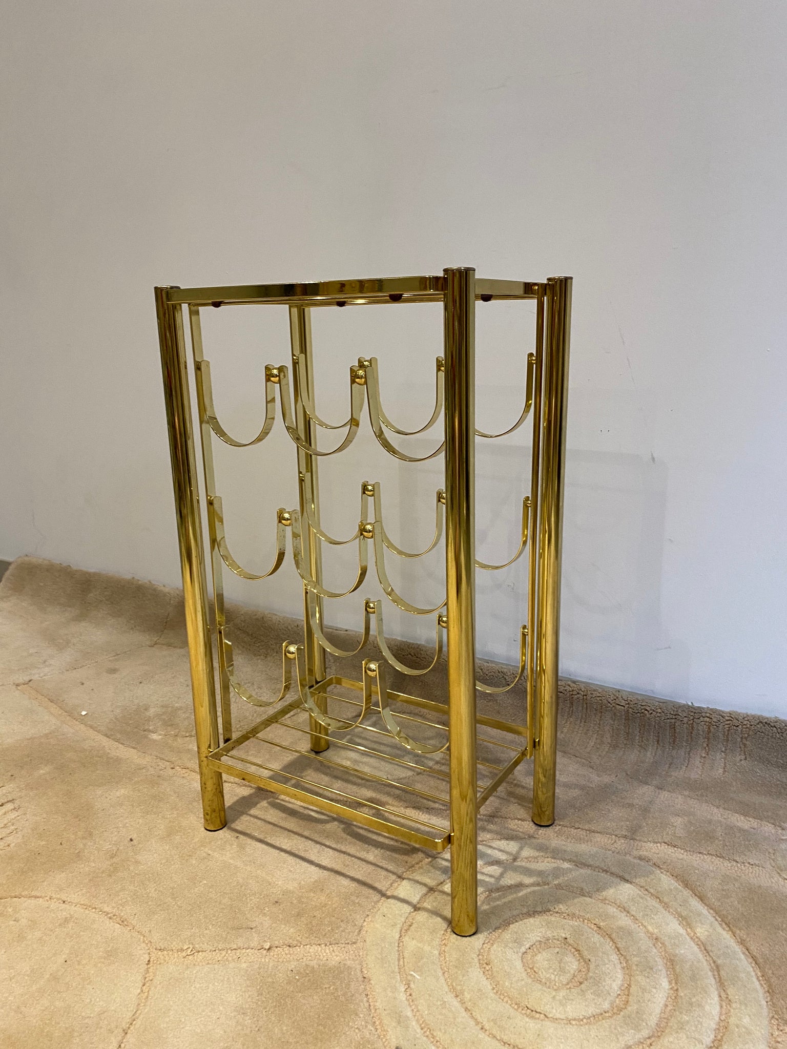 Golden brass wine rack