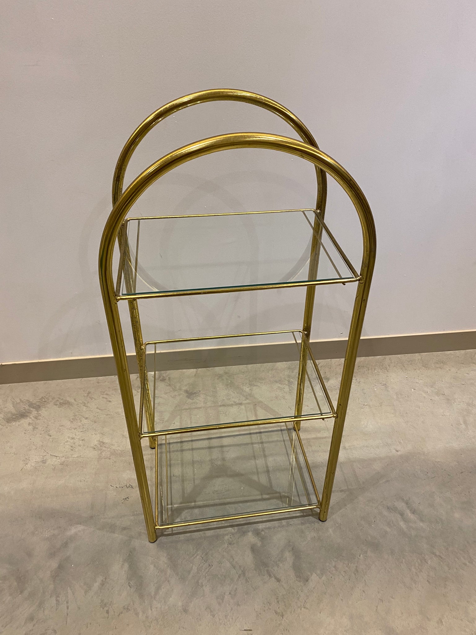 Small arched golden brass shelf