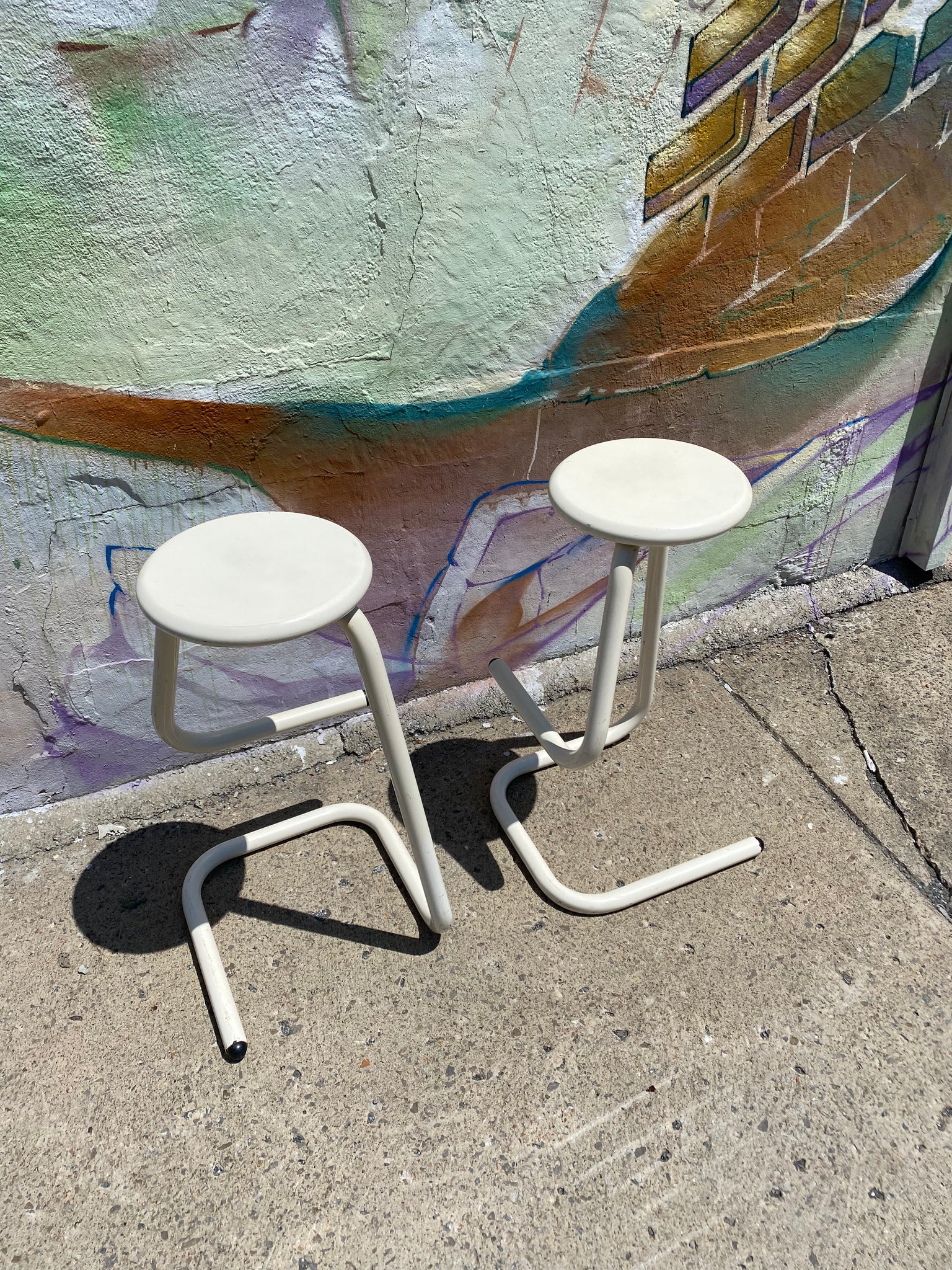 Pair of cream paperclip bar stools