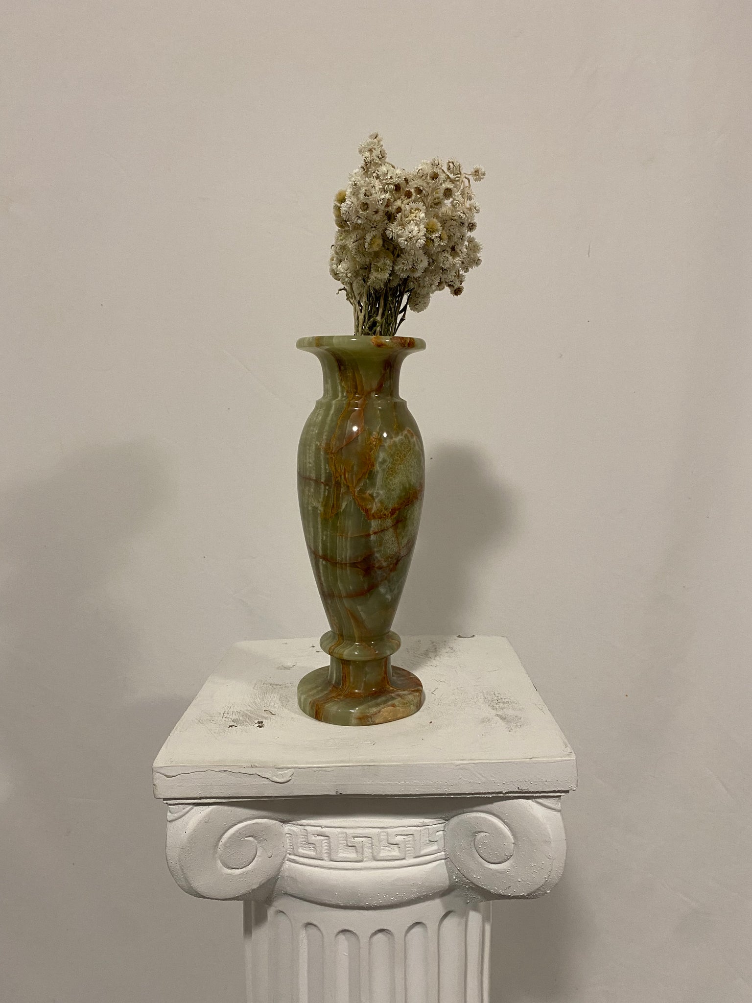 Green marbled stone vase