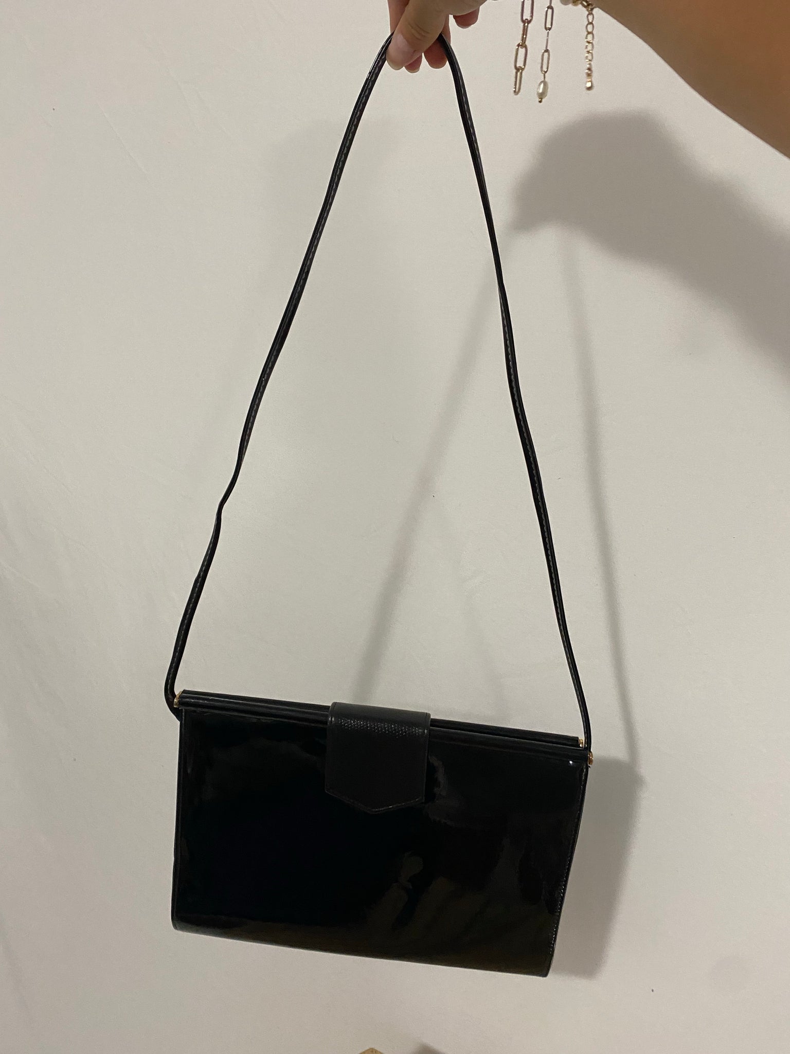 Black patent leather purse and clutch with leather details