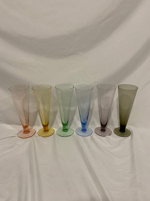 Rainbow of tall colorful glasses