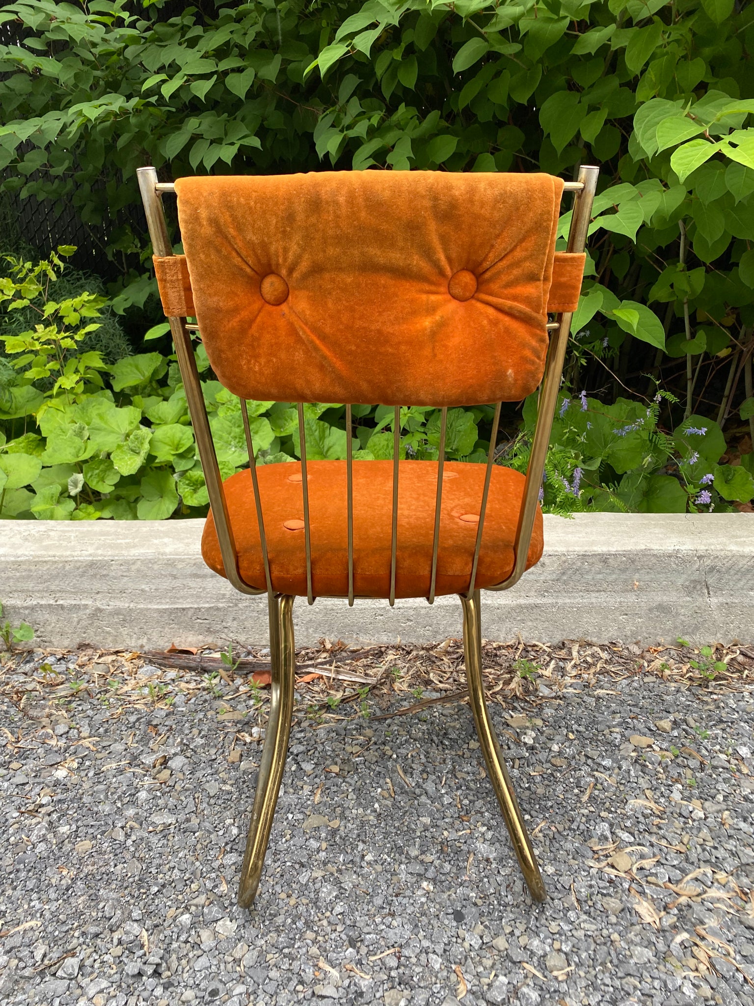 Orange velour & golden brass chairs