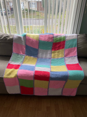 Colorful squares hand knitted blanket