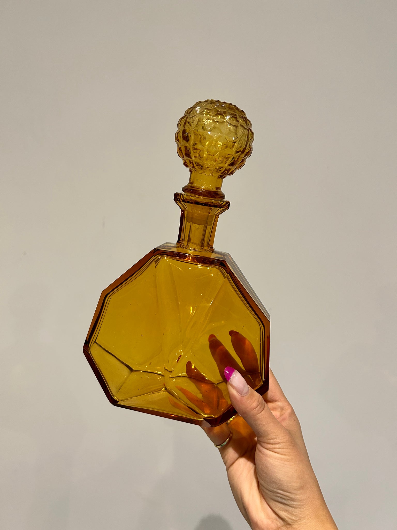 Amber glass beveled liquor bottle