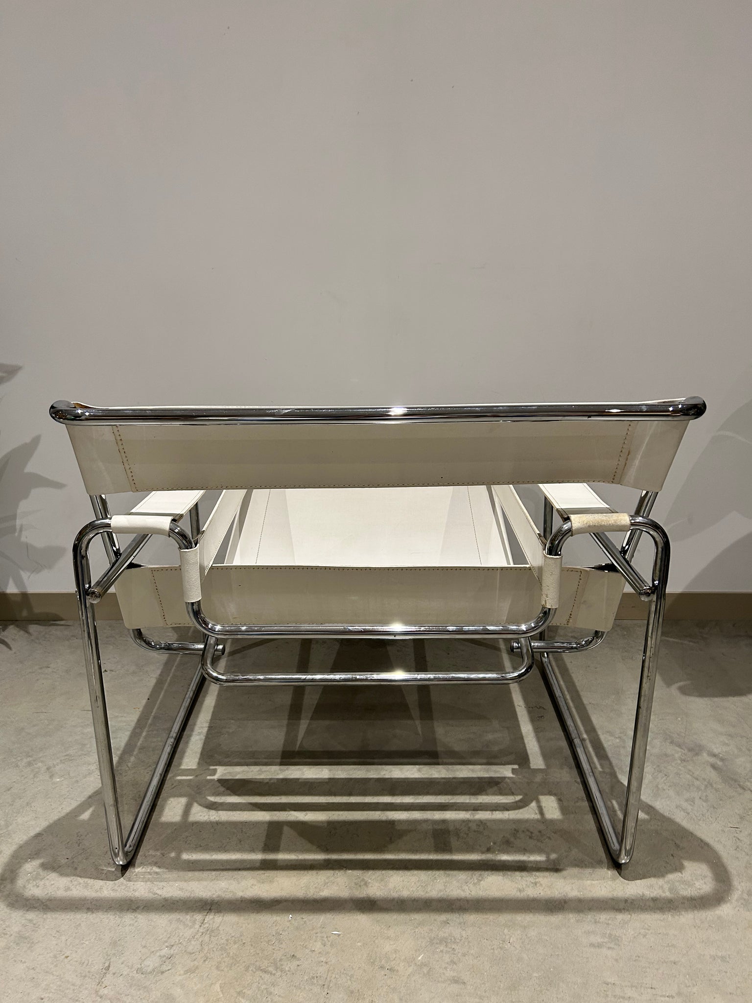White Marcel Breuer Wassily style chairs