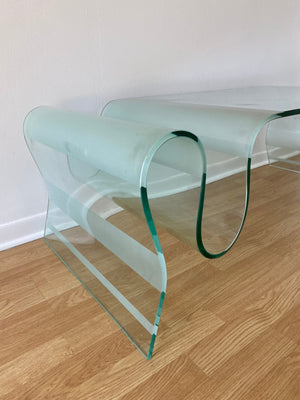 Long curvy waterfall glass coffee table