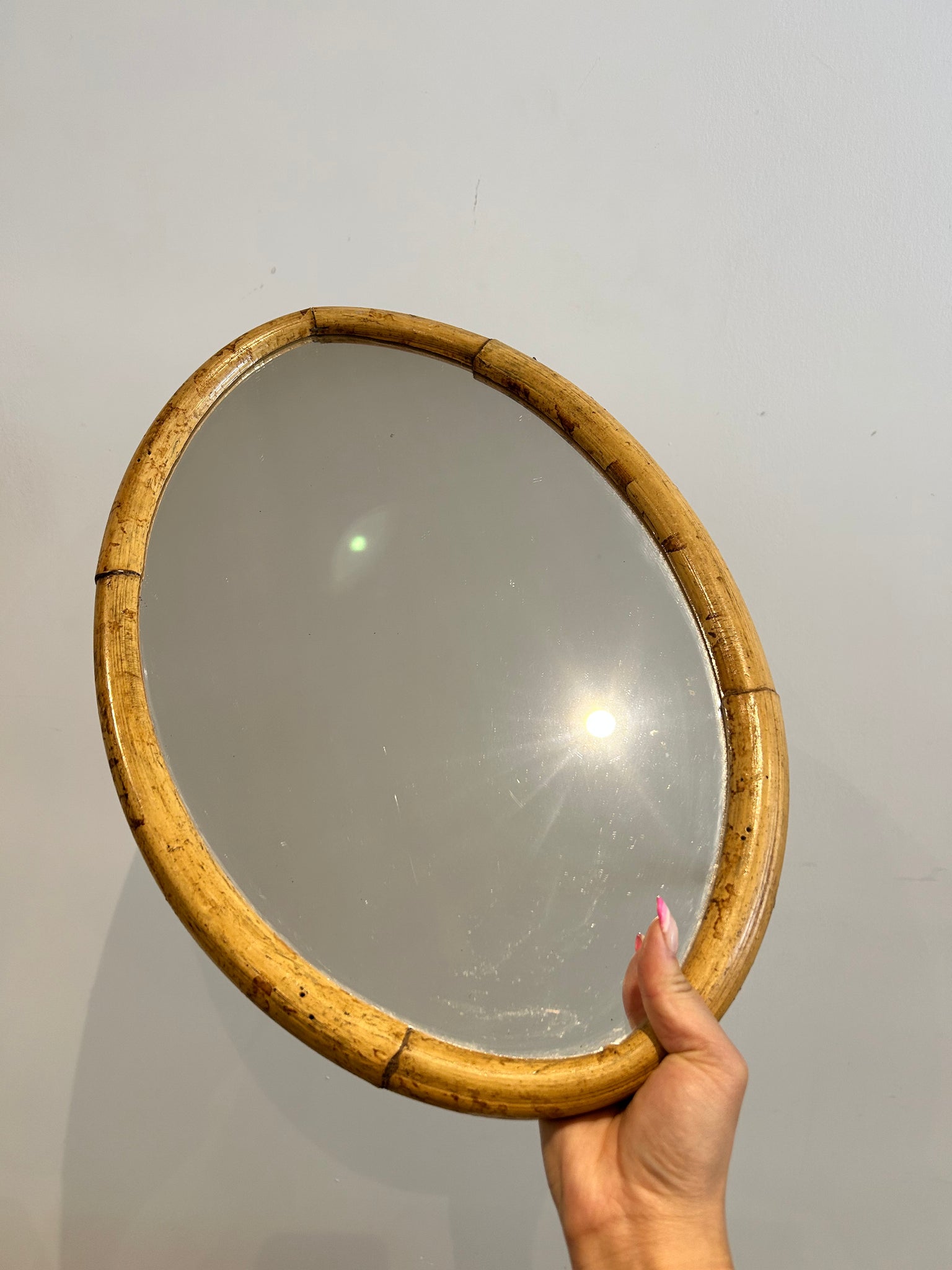Small oval bamboo mirror