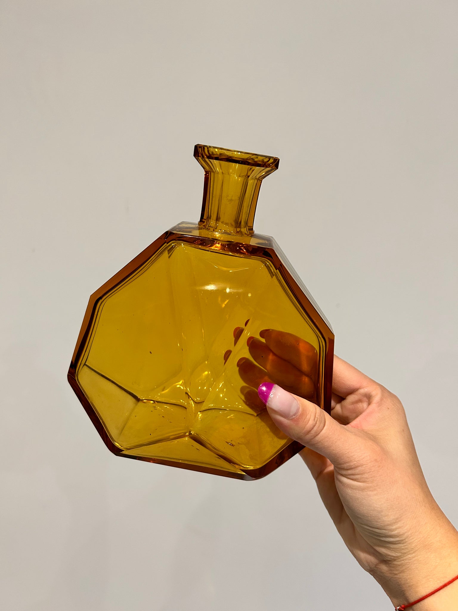 Amber glass beveled liquor bottle