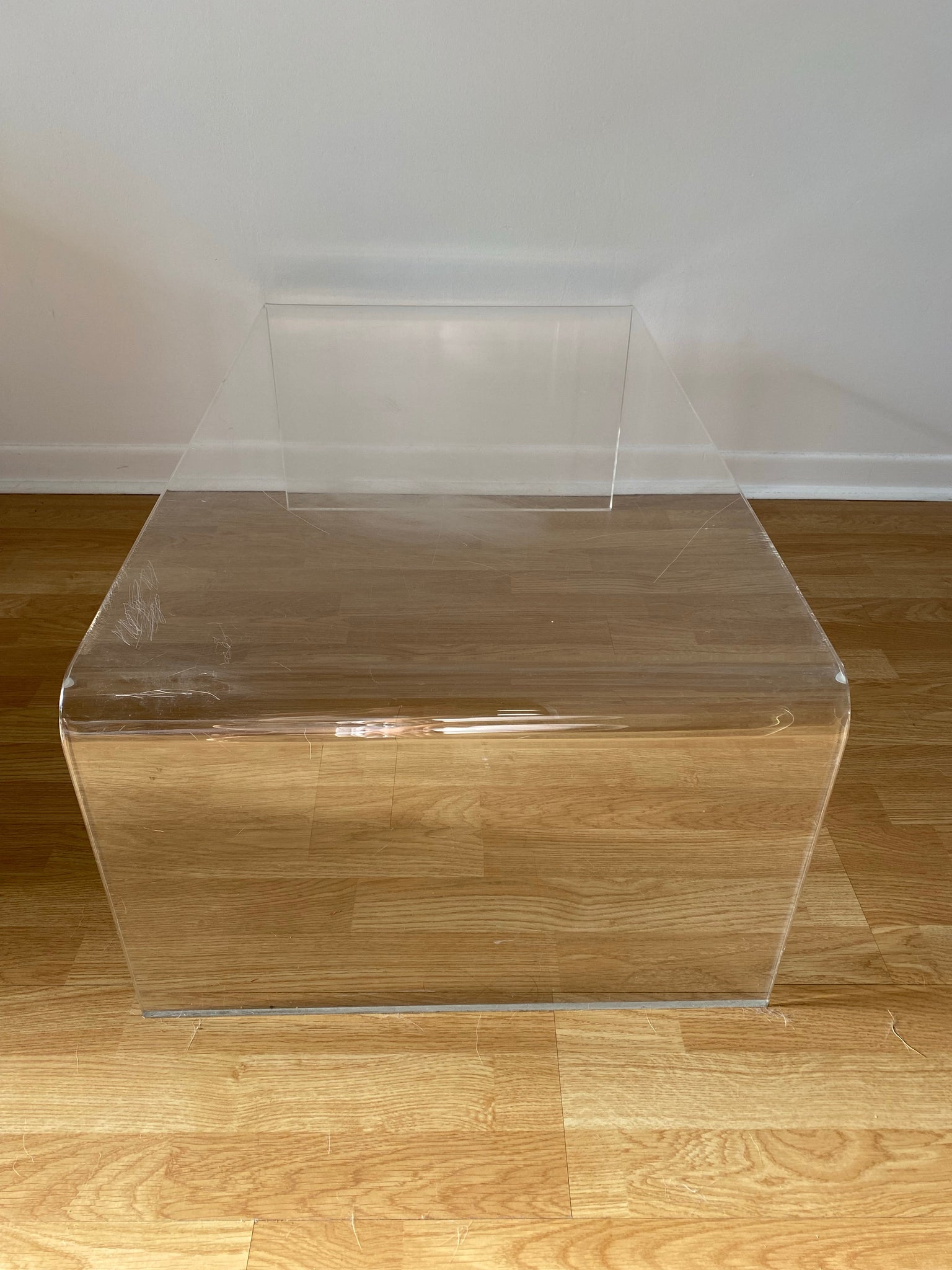 Lucite waterfall coffee table