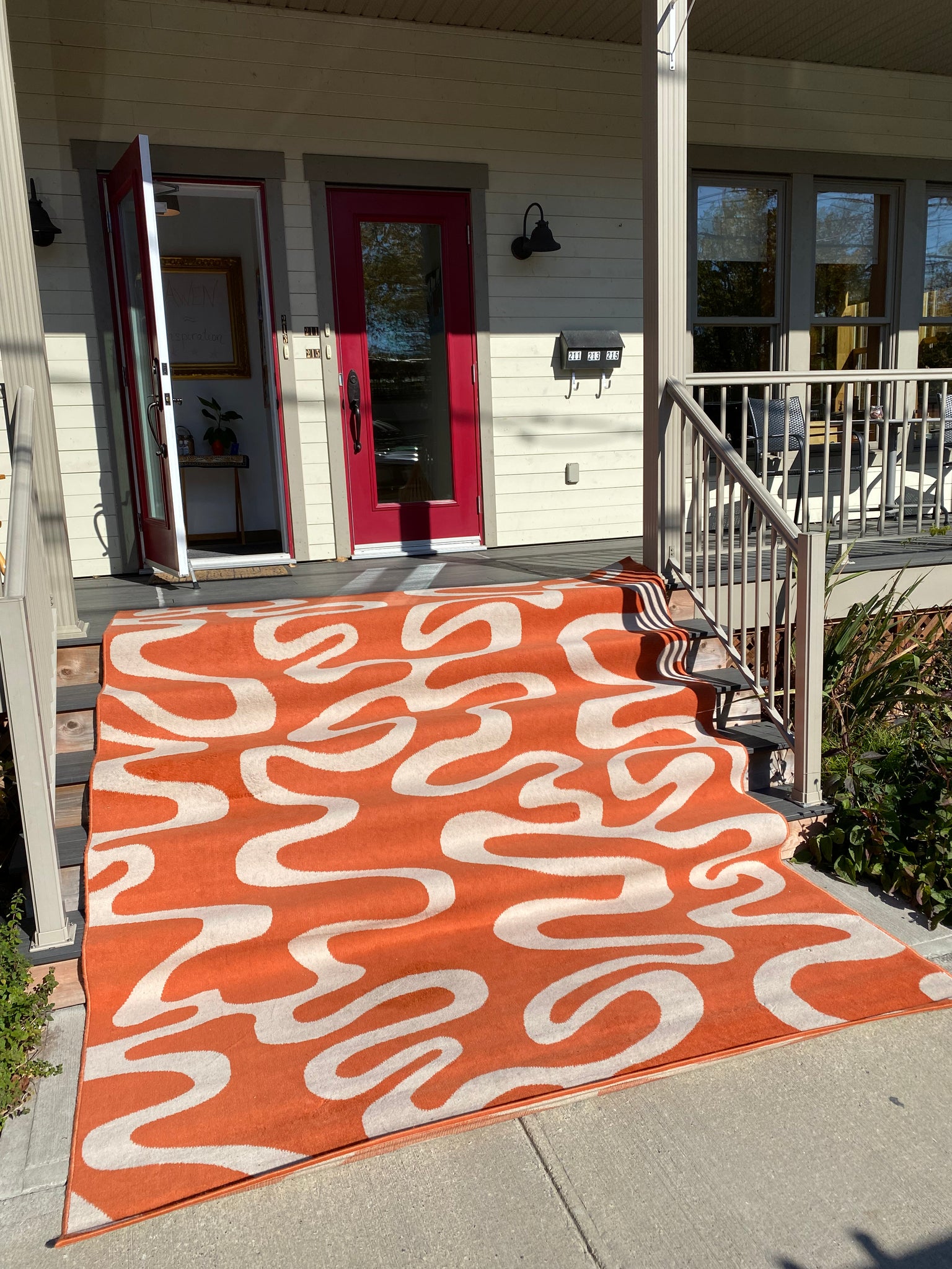 XL orange carpet with white squiggles