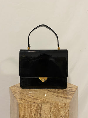 Black patent leather handbag