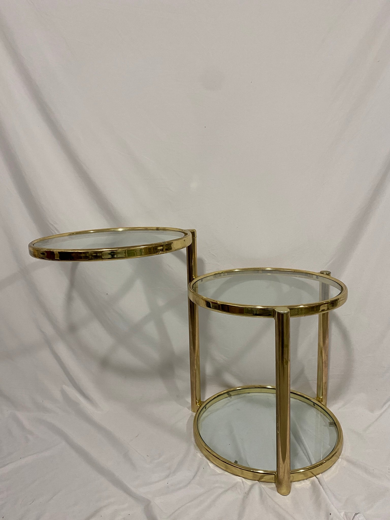 Golden brass & glass swivel table