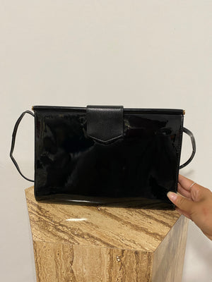 Black patent leather purse and clutch with leather details