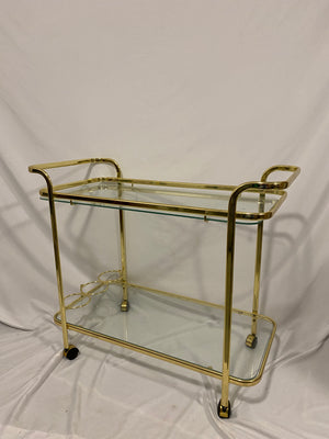 Golden brass bar cart