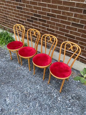 Wooden Thonet chairs with velvety red seats