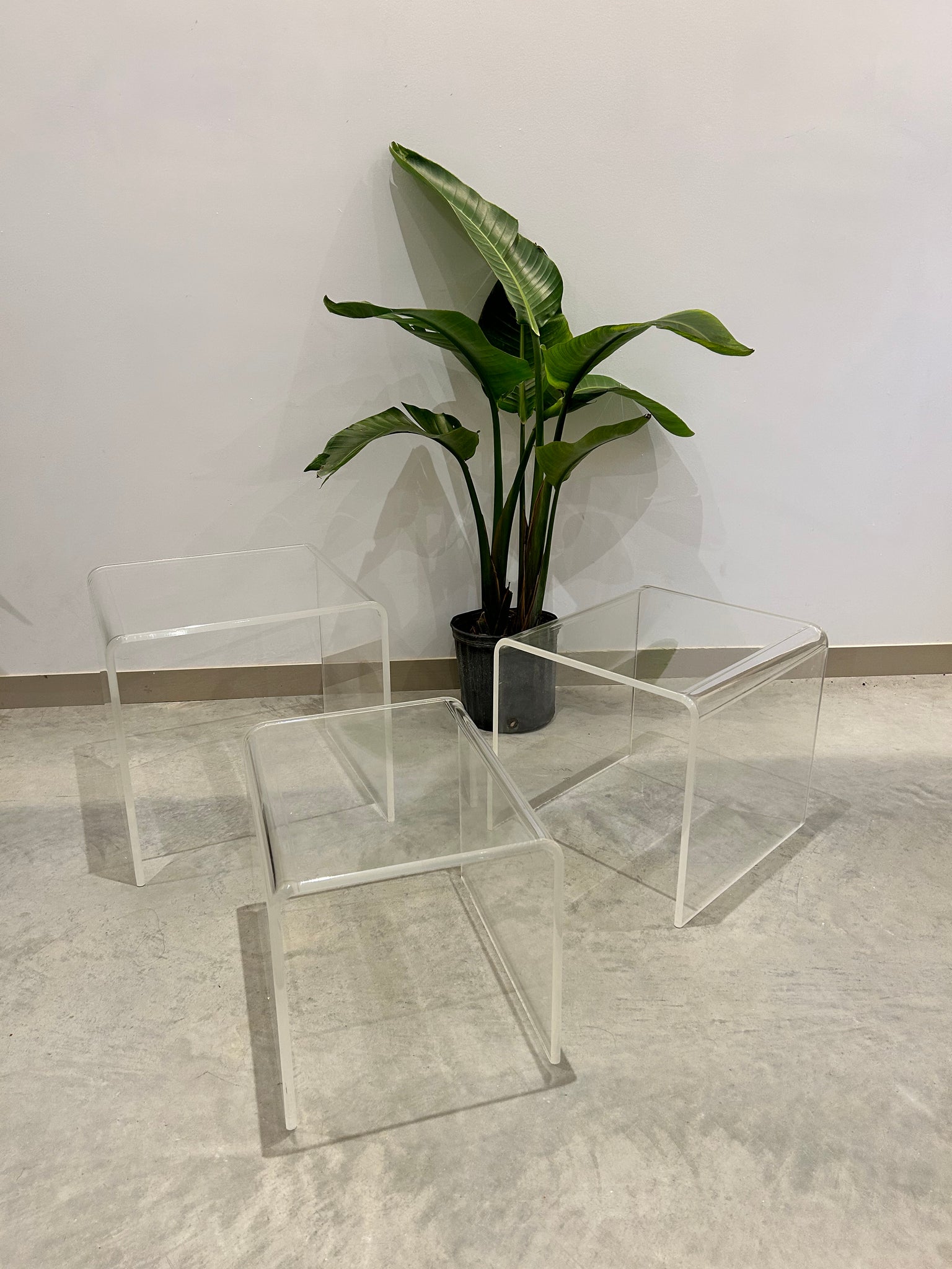 Trio of lucite waterfall nesting side tables