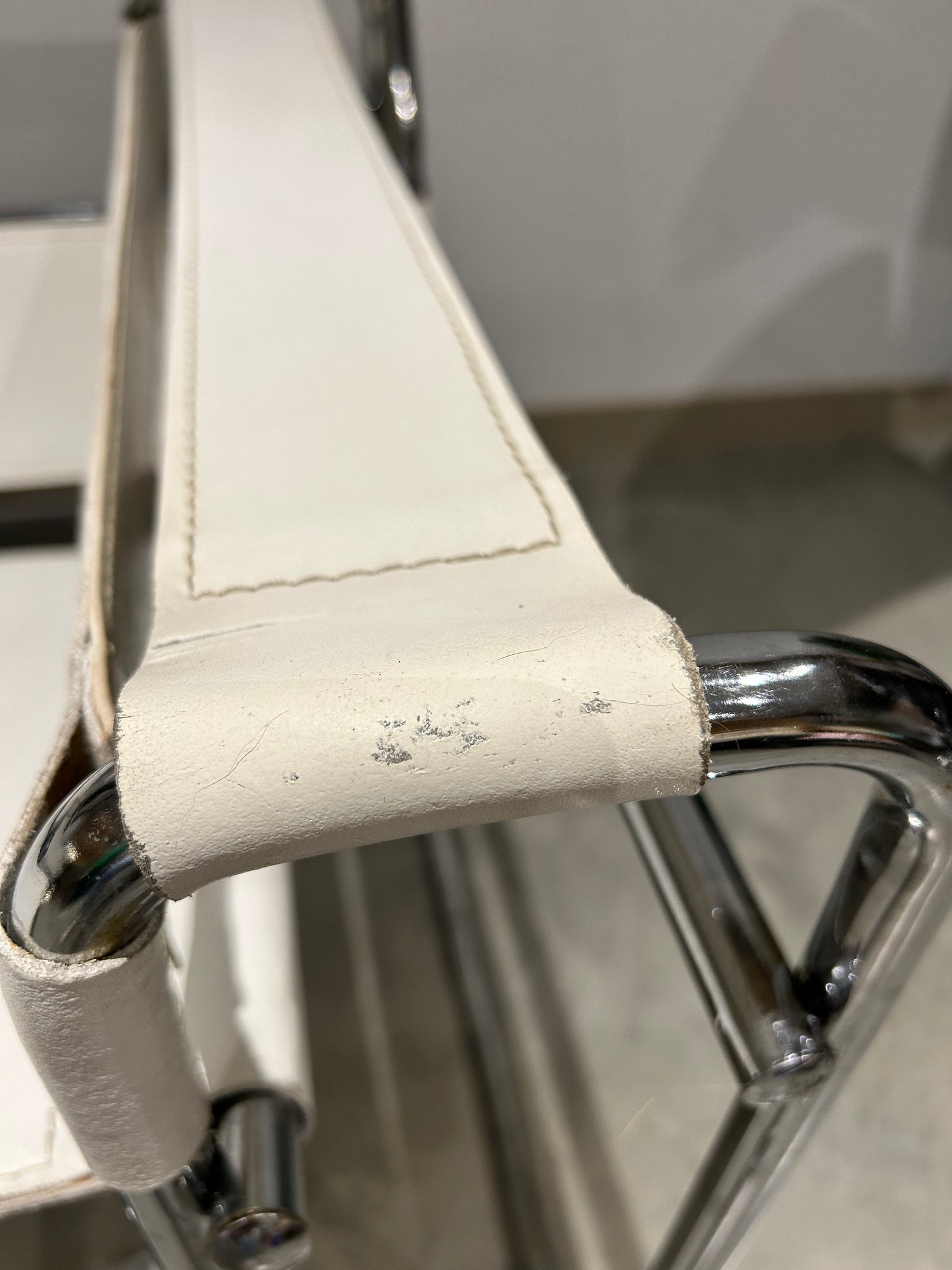 White Marcel Breuer Wassily style chairs