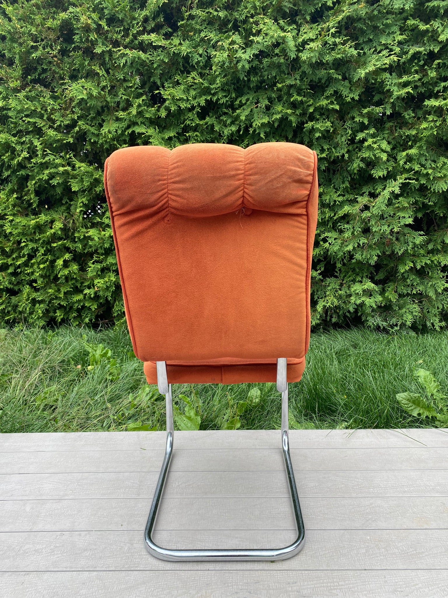 Burnt orange velour & chrome cantilever chairs