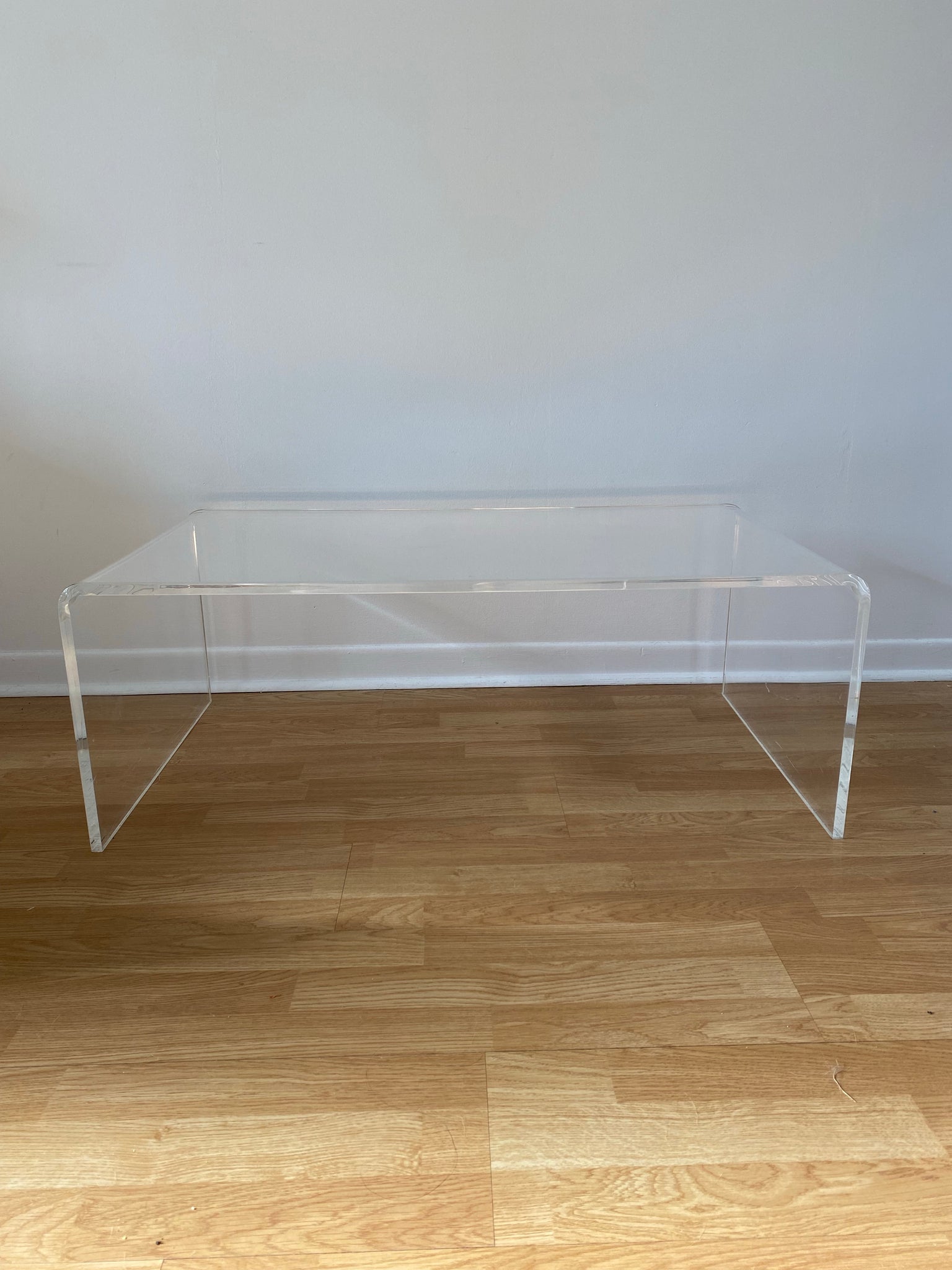 Lucite waterfall coffee table